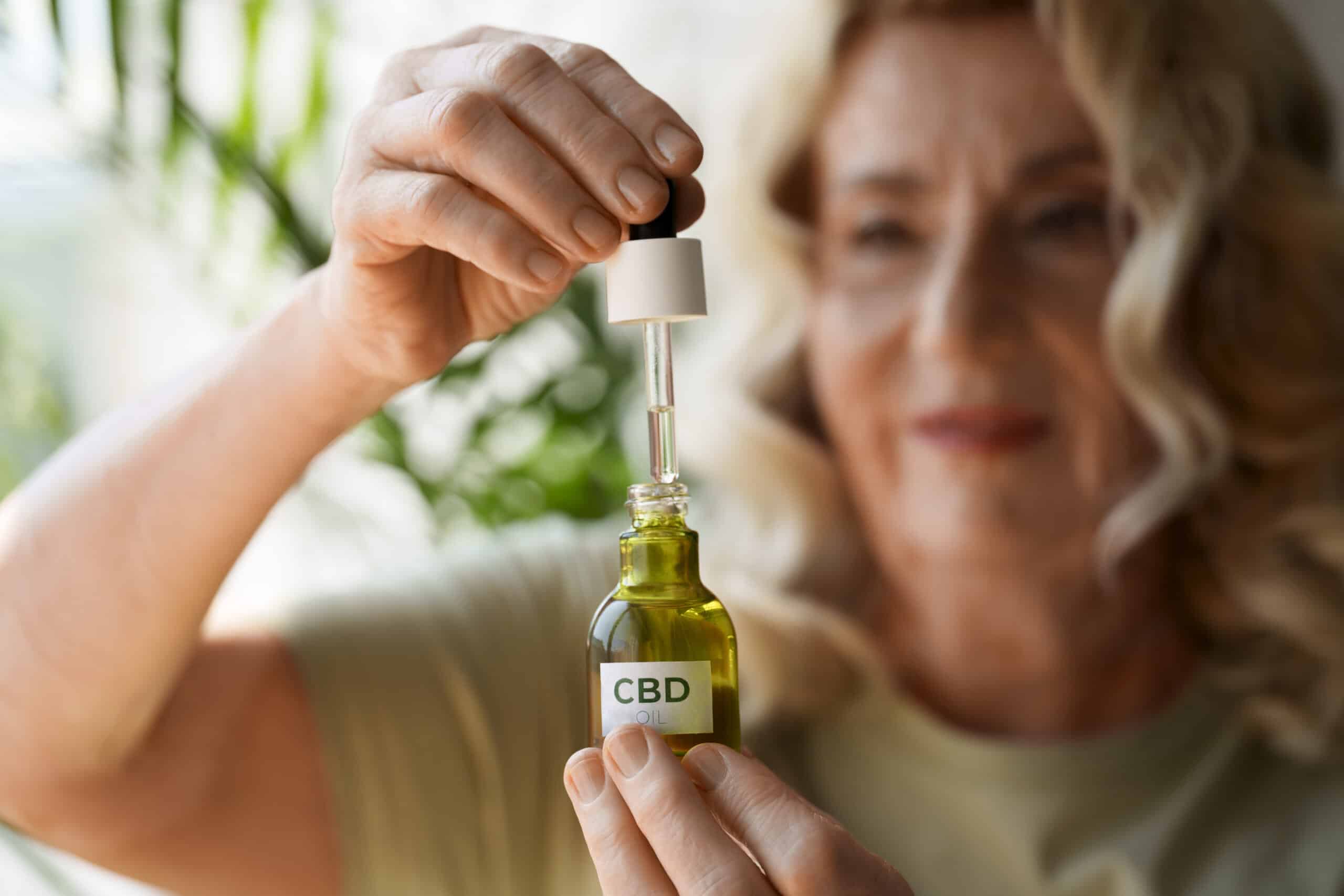Woman with CBD oil